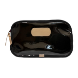 Jon Hart Compass bag with clear front, coated canvas back, and silver zip closure.