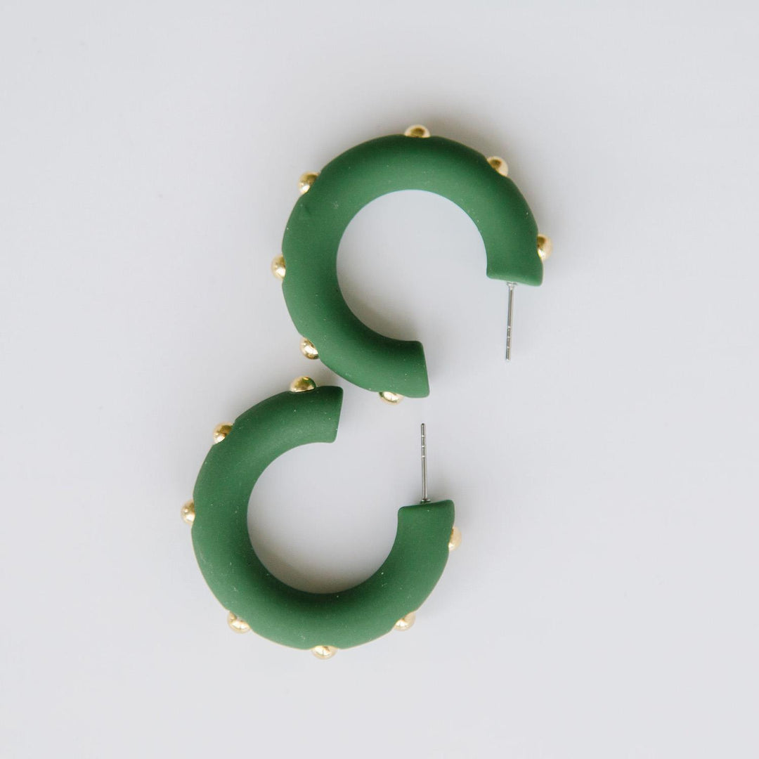 Candace hunter green hoop earrings with gold studs. 