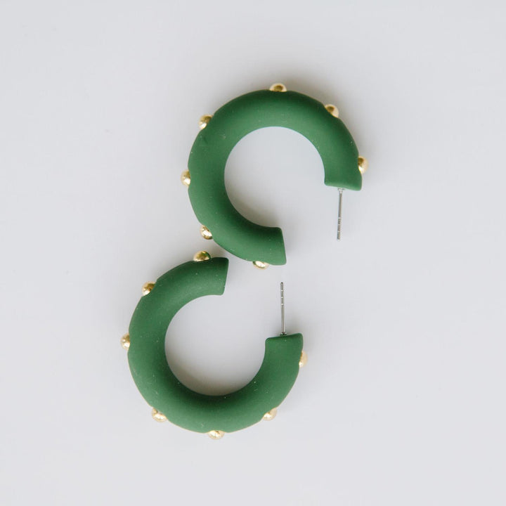 Candace hunter green hoop earrings with gold studs. 