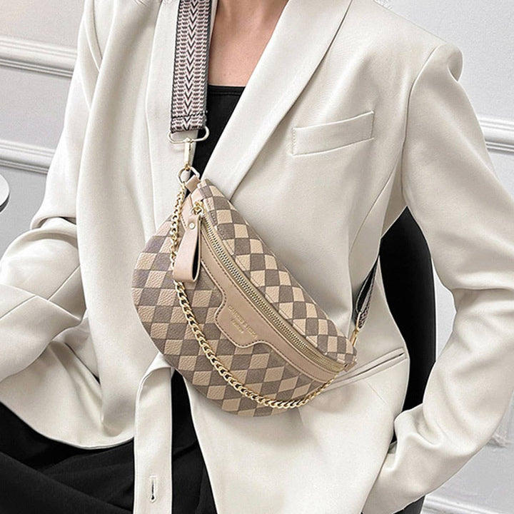 View of model wearing the beige checkered crossbody bag.