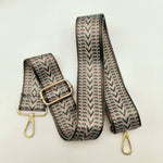 Patterned strap with gold hardware 