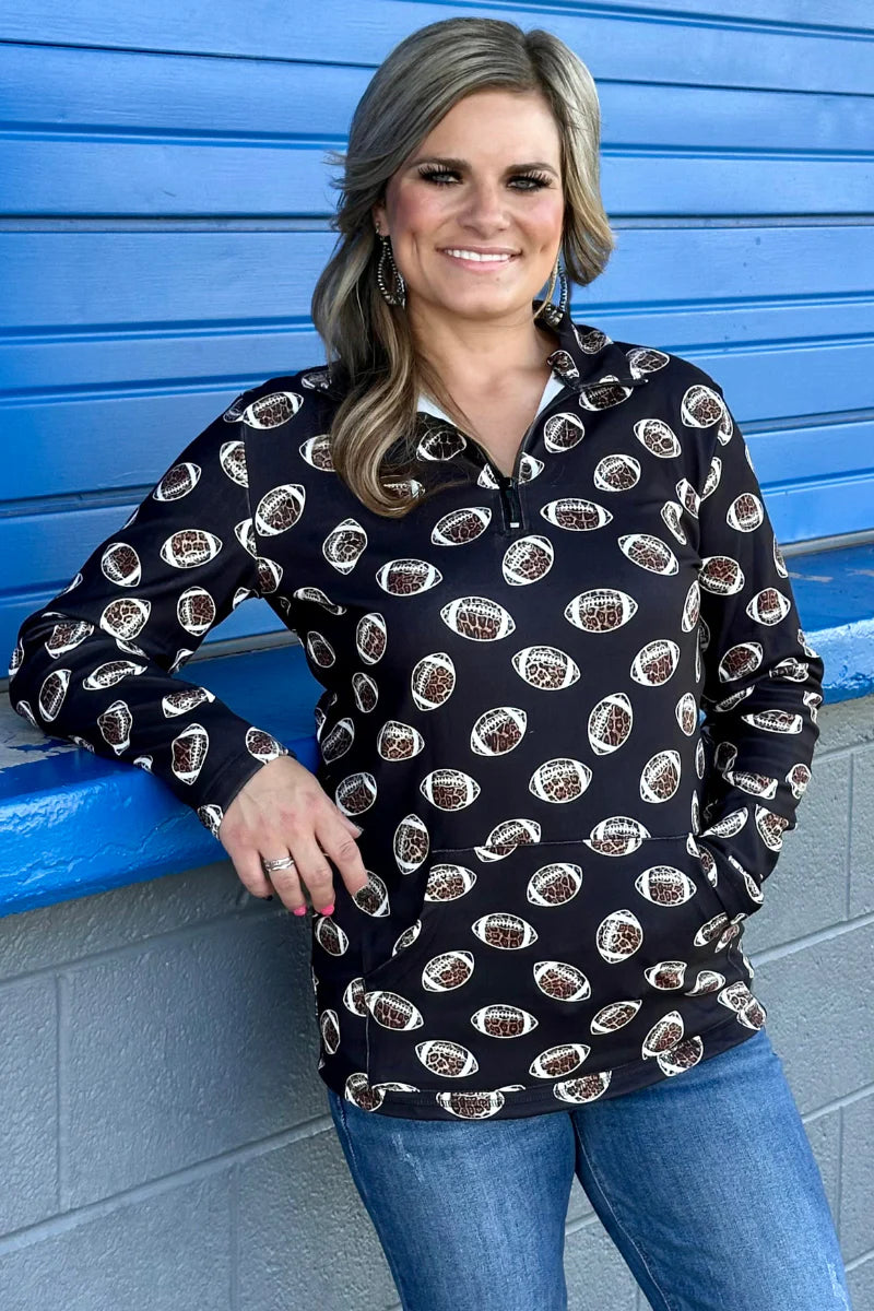 Black quarter zip long sleeve pullover with leopard football graphic design.