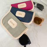 Jon Hart Glasses Case with coated canvas, leather trim, and gold zipper for durable, personalized protection.