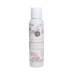 A bottle of Sweet Grace Wrinkle Release Spray with a floral design on the label.