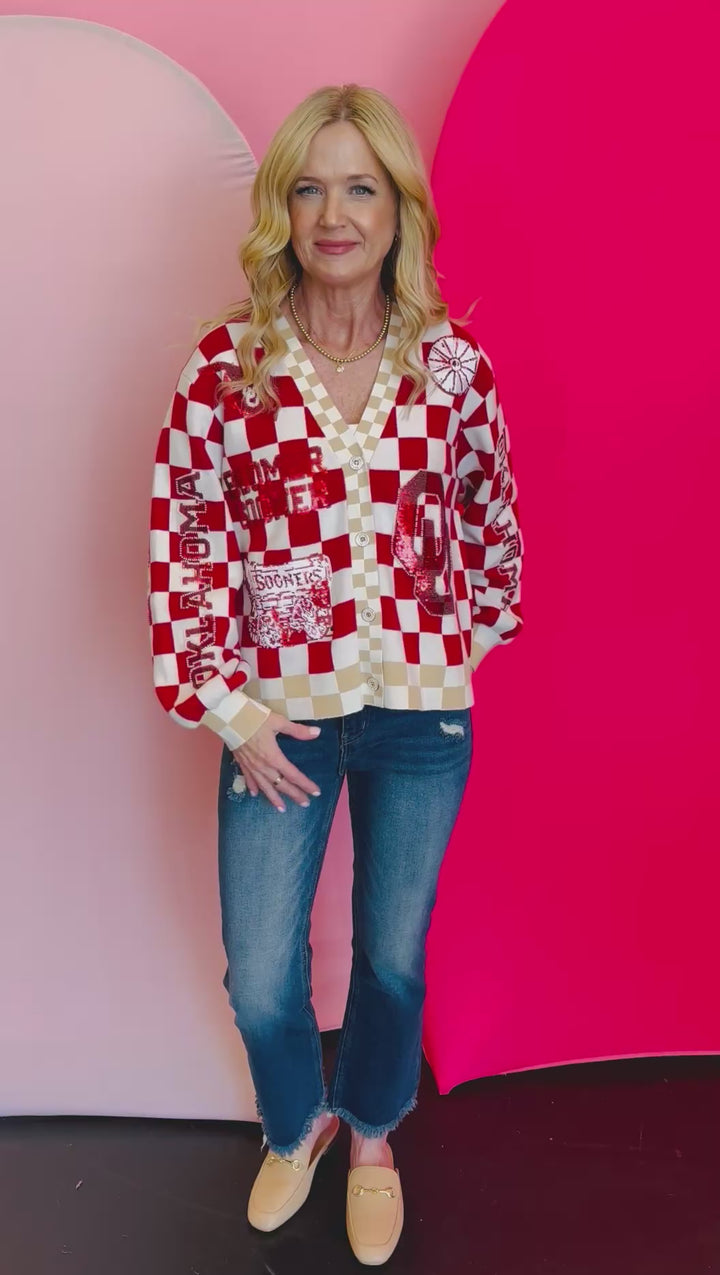 Video of Queen of Sparkles checkered sequin and rhinestone game day cardigan.
