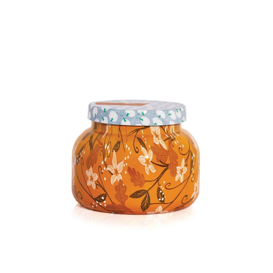 Capri Blue Pumpkin Dulce Candle, 19oz, with festive floral design.