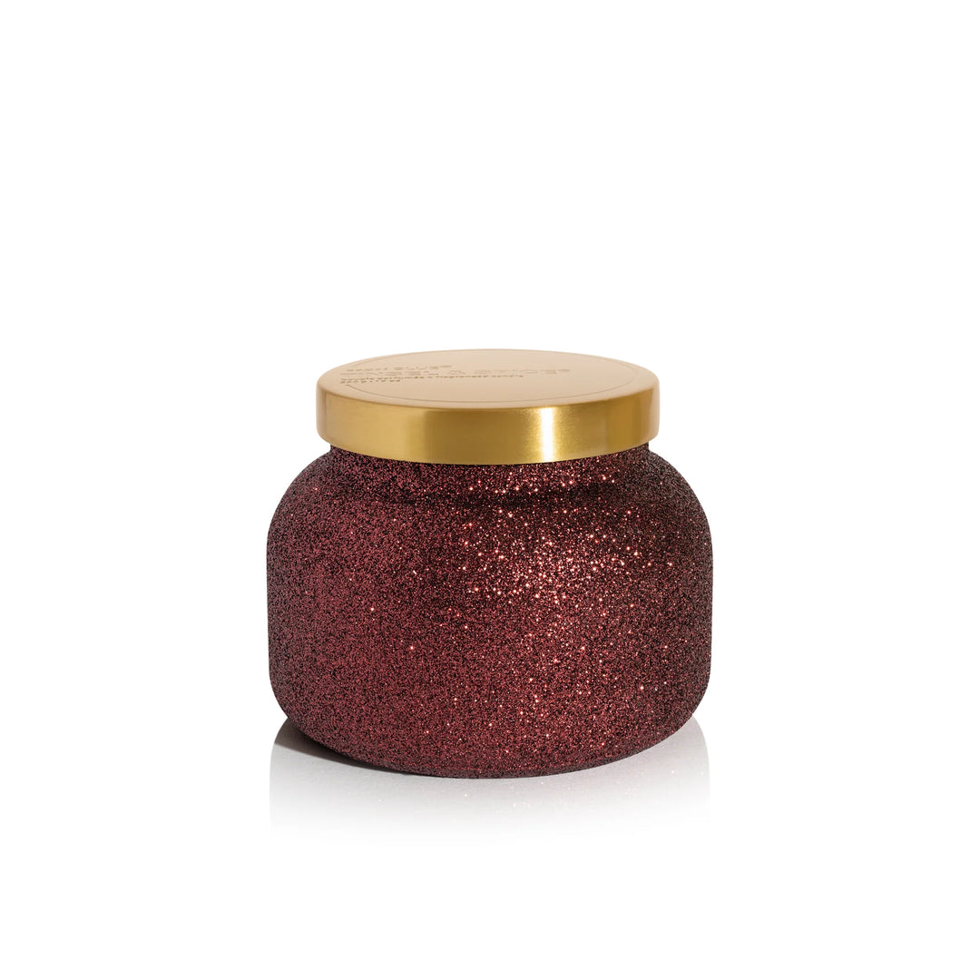 Capri Blue Tinsel & Spice Glam Signature Candle with maroon glitter finish and warm, festive holiday fragrance.
