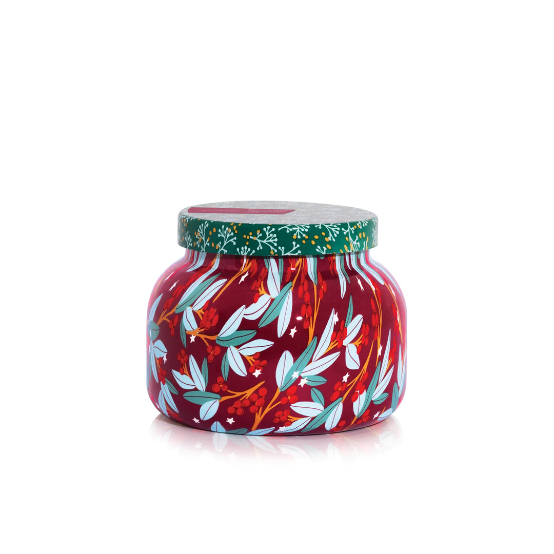 Capri Blue Tinsel & Spice Candle, 19oz, with festive patterned jar.