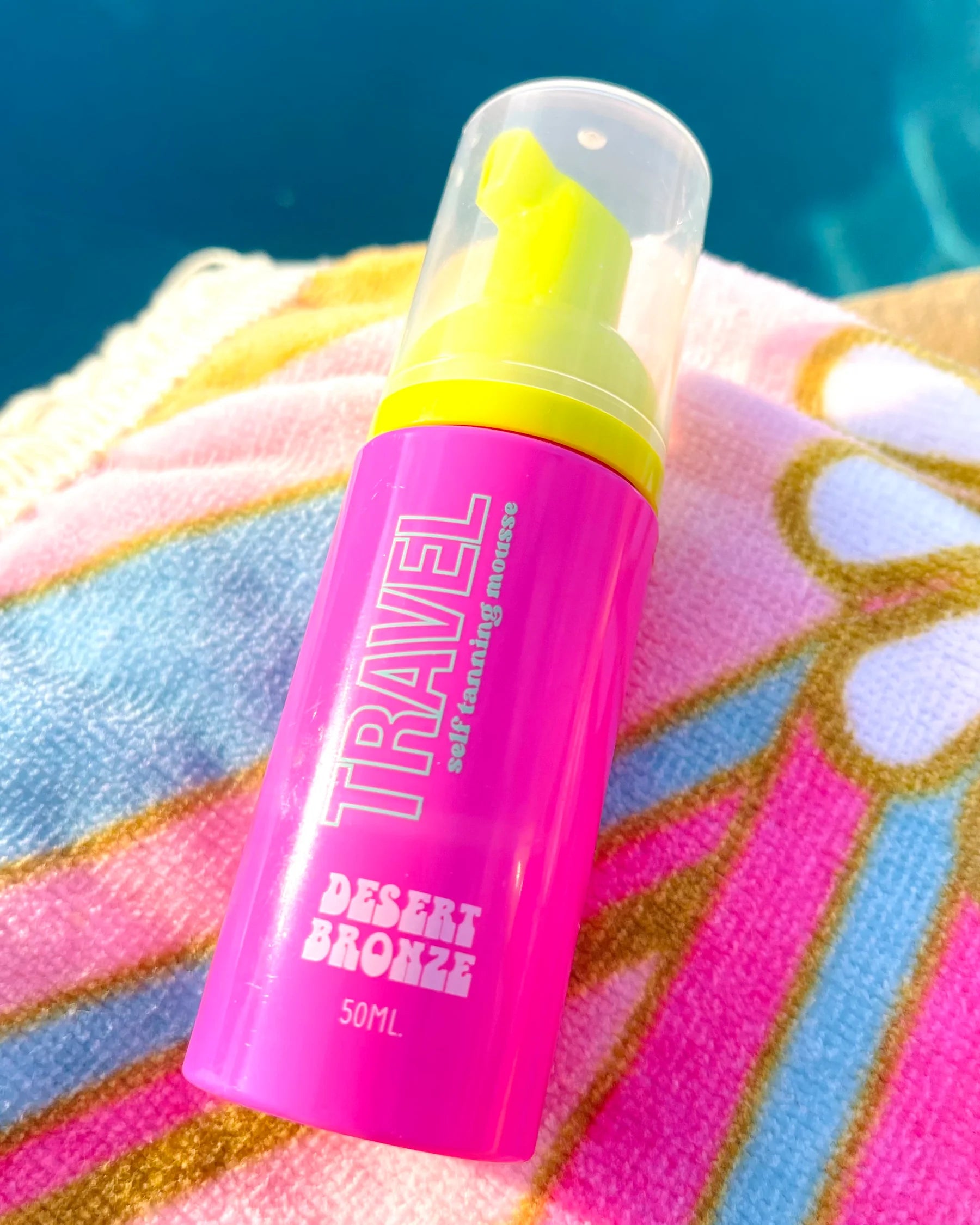 Travel Size Desert Bronze Self-Tanning Mousse 7oz bottle for natural, streak-free tan on the go