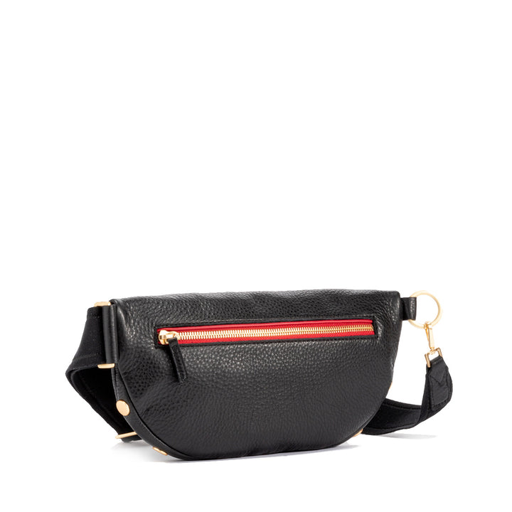 Hammitt Charles - A large sling crossbody in black luxury leather with a red zip and gold hardware.