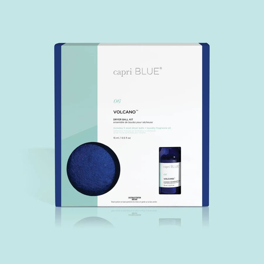Volcano Dryer Ball Kit with cobalt blue wool balls and citrus-scented fragrance oil for soft, fresh laundry