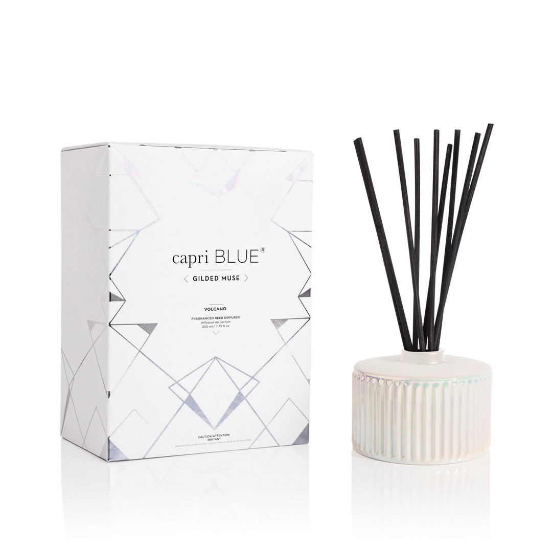 Volcano White Opal Gilded Reed Diffuser 7.75oz – tropical citrus-scented flameless diffuser in a white opal gilded glass vessel.