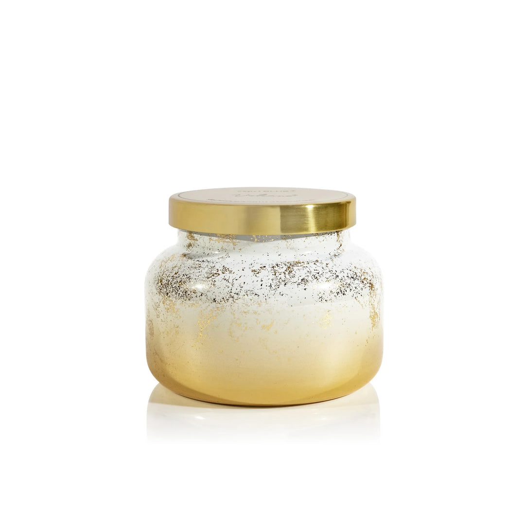 Capri Blue - 19oz Volcano Glimmer Signature Candle with an ombre design and metallic accents.