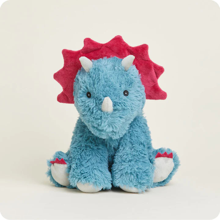 A soft, plush triceratops toy with three horns and a frill, designed to be microwavable.