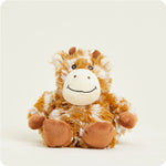 A small, soft plush giraffe toy with a spotted pattern, designed to be microwavable.