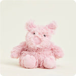 A small, soft pink plush pig toy with a curly tail and snout, designed to be microwavable.