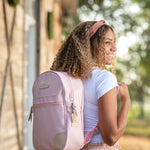 Jon Hart coated canvas backpack with leather trim and multiple pockets.