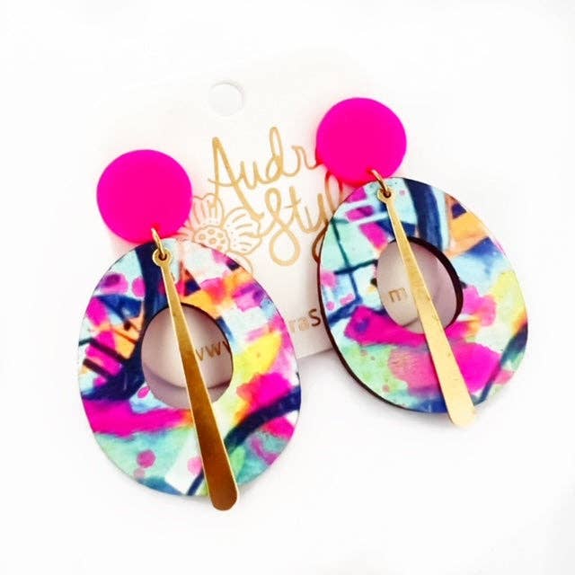 Colorful Circle Dangle Earrings by Audra Style. Has Pink acrylic at the top, hand painted wood and gold dangle