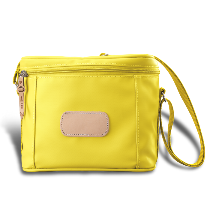Versatile insulated Jon Hart lunch box with removable insert, zip closure, and adjustable shoulder strap in coated canvas with natural leather trim.