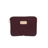 Jon Hart 13-inch padded computer case in coated canvas with natural leather trim, zippered closure, and protective padded interior — sleek sleeve for laptops up to 13 inches wide.