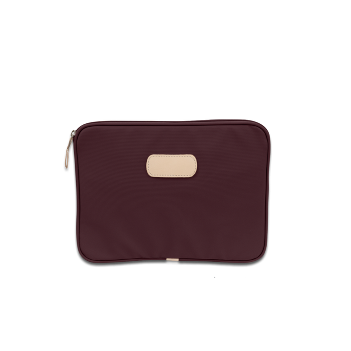 Jon Hart 13-inch padded computer case in coated canvas with natural leather trim, zippered closure, and protective padded interior — sleek sleeve for laptops up to 13 inches wide.