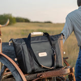 Jon Hart Large Cooler with leather trim, foam insulation, and adjustable snaps for spacious cold storage.