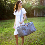 Jon Hart Medium Square Duffel with coated canvas, leather trim, and trolley sleeve for organized carry-on travel.