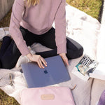 Jon Hart 15-inch padded computer case in coated canvas with natural leather trim, soft protective interior, and full zip closure — designed for laptops up to 15 inches wide.