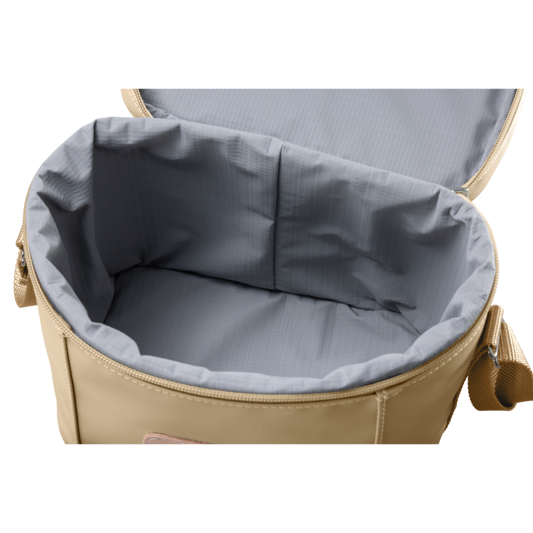 Versatile insulated Jon Hart lunch box with removable insert, zip closure, and adjustable shoulder strap in coated canvas with natural leather trim.