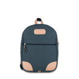 Jon Hart french blue coated canvas backpack with Natural Leather trim, front zip pocket, two side pockets, and adjustable leather-detailed straps.