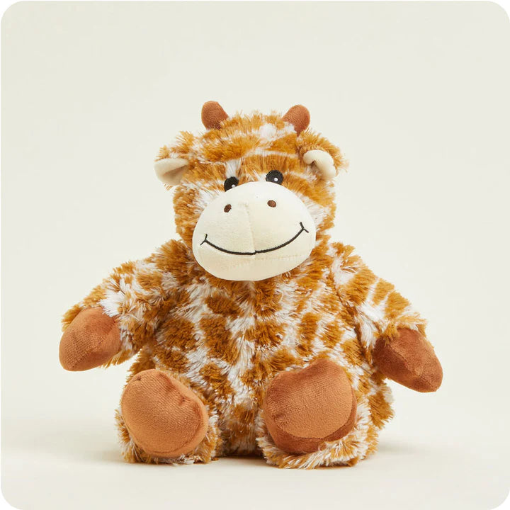 A soft, plush giraffe toy with a long neck and spotted pattern, designed to be microwavable.